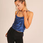 ONE ABOVE ANOTHER Blue Sequin Crop Top With Lace Up Back
